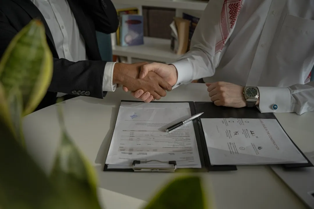korean office workers handshake